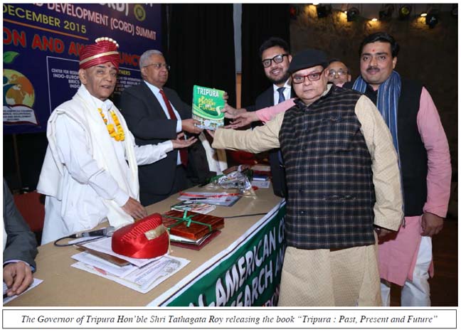 The Governor of Tripura Hon’ble Shri Tathagata Roy releasing the book “Tripura : Past, Present and Future”