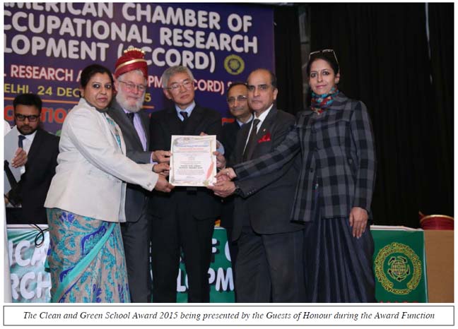 The Clean and Green School Award 2015 being presented by the Guests of Honour during the Award Function